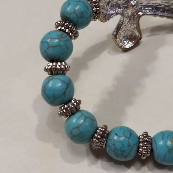 Gypsy Jewels Simulated Turquoise Sideways Silvertone Cross Stretch Bracelet - Picture 4 of 6